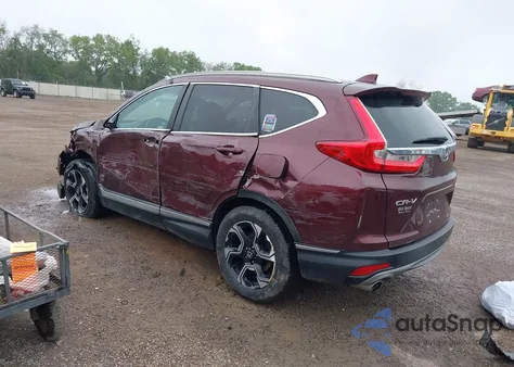 2019 Honda Cr-V Touring z USA, uszkodzony, nr VIN 2HKRW2H95KH617890